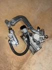 Kawasaki KX85-KX100-KX112 2014-2025 Oem Complete Rear Brake System Assembly Used. Price: $200.00.
