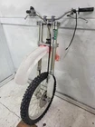 1997 Honda CR125R Front Forks Suspension Shock Leg Tube W/ Wheel Rim Used. Price: $760.00.