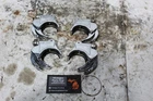 Harley Oem 49MM Windshield Clamp Set Of Chrome Used. Price: $125.00.