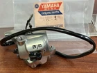 New Nos Factory Yamaha Part# 323-82920-32-94 Right Handlebar Asbly 1973-75 RD60. Price: $89.00.