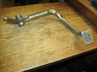1975 Yamaha RD125B Rear Brake Pedal 1E7-27211-00-93 Used. Price: $20.00.