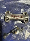 2004 01-08 Triumph Thunderbird 900 Bracket Front Emblem Used. Price: $94.00.